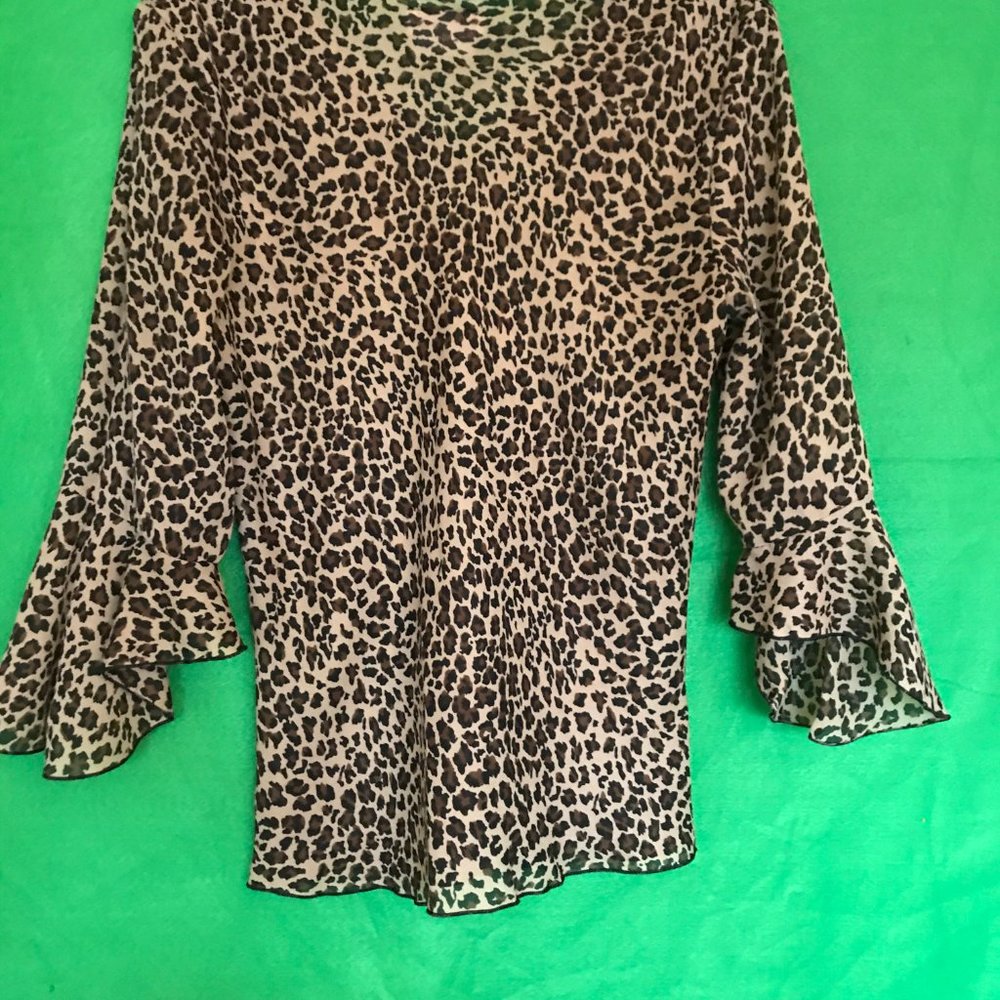 A. Buyer Leopard Print Sheer Blouse